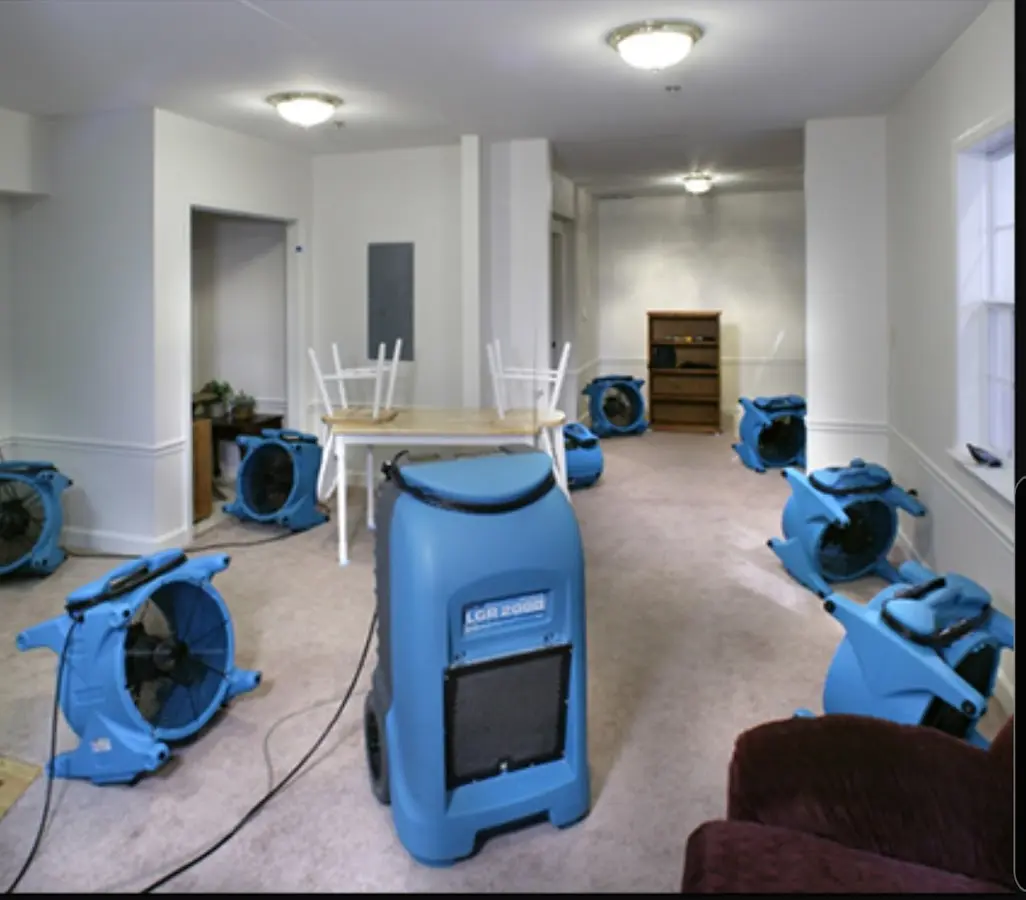 Air movers and dehumidifier setup for Water Damage Restoration in Silver Springs